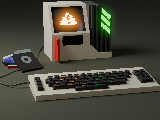 An old keyboard and computer, with a warning sign on the computer's orange CRT display.